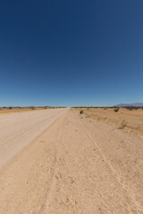 scenic view of an empty gravel road in Namibia