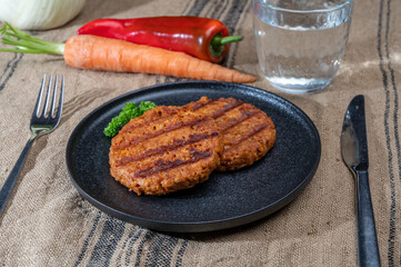 Tasty vegan burgers made from vegetarian plant based soya beans imitation meat