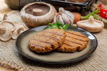 Tasty vegetarian burgers made from healthy quinoa, basil, portobello champignon and shiitake mushrooms