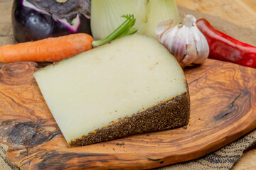 Cheese collection, aged hard Italian sheep cheese black pecorino from Sicily island or pecorino nero di Sicilia