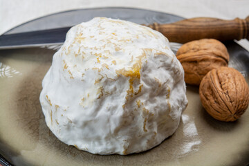 Cheese collection, soft cow French cheese with mold Gaperon artisanal lavored with cracked peppercorns and garlic produced in Auvergne