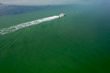 A drone view of a speed boat in Tampa Bay.