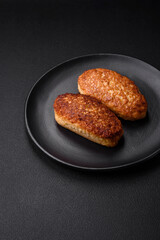 Delicious fried cutlets or meatballs from minced fish with spices and herbs
