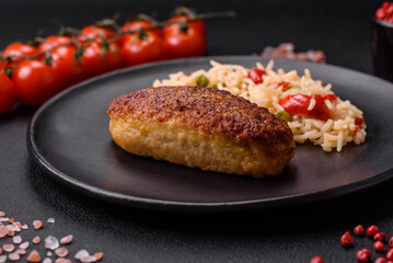 Delicious fried cutlets or meatballs of minced fish with rice