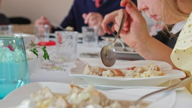 People Eating Dinner during Easter Holiday Family Gathering