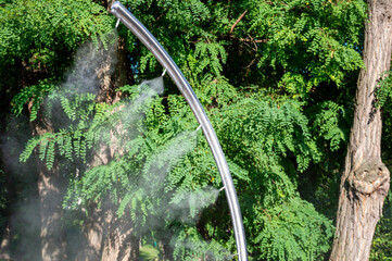 Cold water sprayer on a very hot day