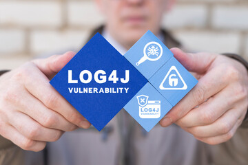 Log4j vulnerability concept. Electronic security specialist holding styrofoam blocks with...