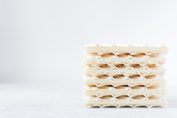 Vanilla wafers on a marble plate, wafer cookies filled with vanilla cream