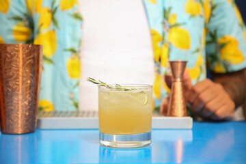 refreshing tropical summer cocktail with rosemary and orange