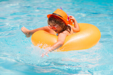 Child floating in pool. Child relaxing in pool, drink summer cocktail. Kids summer vacation. Children floating in water pool. Children playing and active leisure, swimming pool concept. - Powered by Adobe