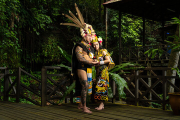 A Borneo couple showcasing the beauty of her culture through stunning traditional clothing