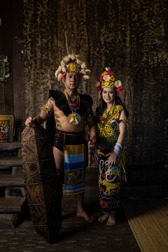 A Borneo couple showcasing the beauty of her culture through stunning traditional clothing
