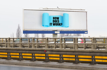 On the highway there is an advertising billboard with the image and the inscription - how does it...