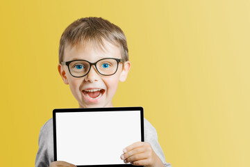 a Happy child boy holding a tablet on png background