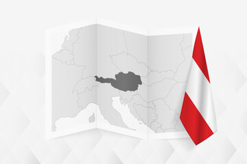A grayscale map of Austria with a hanging Austrian flag on one side. Vector map for many types of news.