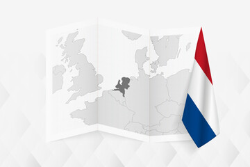 A grayscale map of Netherlands with a hanging Dutch flag on one side. Vector map for many types of news.
