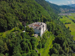 Aerial view Tratzberg castle in Stans, Tirol. Austria by drone. Alps mountains. River Inn.
