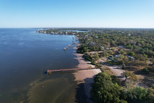 A beautiful drone photo of Crystal Beach. A community park with a fishing pier in Tampa Bay.