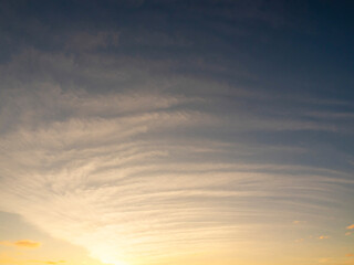 Stunning sun rise sky with clouds. Warm and cool color. Background for design and sky replacement.