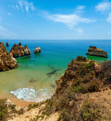 Top view on sandy beach Dos Tres Irmaos (Portimao, Alvor, Algarve, Portugal).