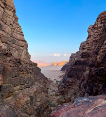 Fototapeta na wymiar Glimpse between the mountains of the Wadi Rum desert in Jordan.