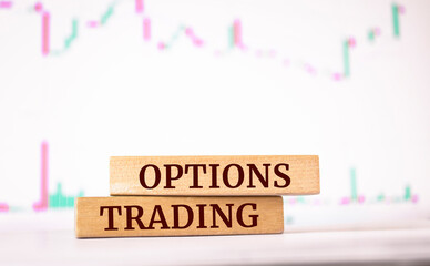 Wooden blocks with words 'options trading'. Business concept