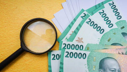 White envelope with twenty thousand rupiah bills. business concept