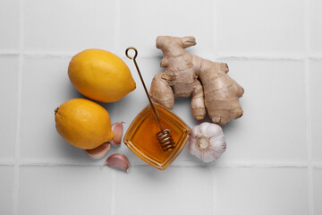 Cold remedies on white tiled table, flat lay. Cough treatment