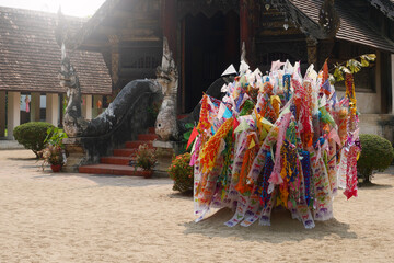 Songkran Festival is celebrated in a traditional New Year's Day, A Lovers comes to decorate Tung at Wat Ton Kwen temple in Chiang Mai, Thailand.