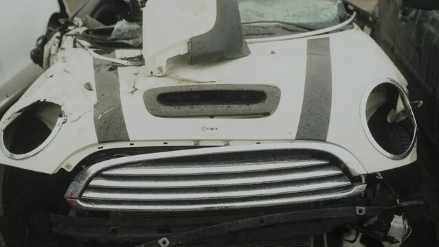 Holes from shrapnel in the body of a civilian car. Ukraine. Bucha 2022