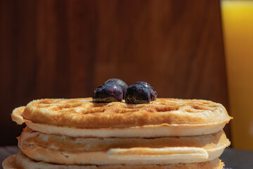 Tasty Breakfast with Wood-Fired Waffles and Fresh Blueberries