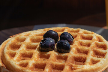 Tasty Breakfast with Wood-Fired Waffles and Fresh Blueberries