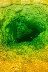 Looking Into Thermal Pool Fading From Yellow To Deep Green