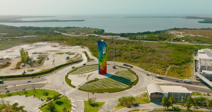 Color monument in urban roundabout. Window of the world. Barranquilla, Colombia. Aerial shot. 