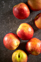 Fototapeta na wymiar Nectarine peach, on a gray background