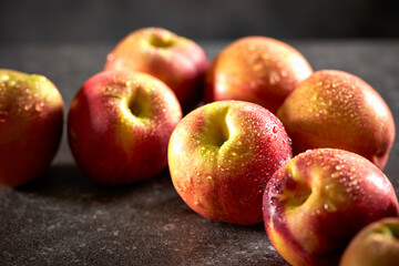 Nectarine peach, on a gray background