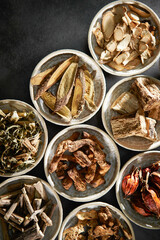 Various kinds of herbal medicines on a plate	