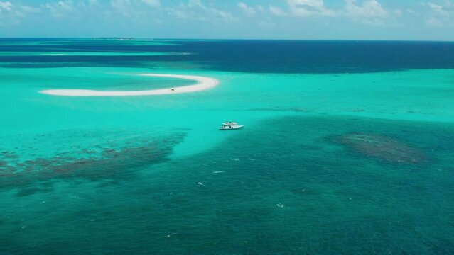 Aerial view on boat next to the sandbar in the Vaavu atoll, Maldives.