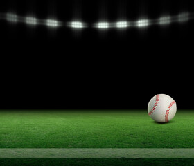 Baseball ball on a grass field with stripe and black background under lights