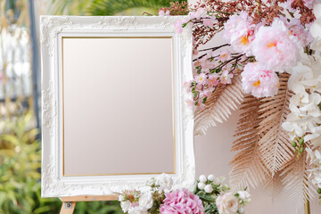 Empty photo display board on stand for wedding arch or text advertisement. Clipping path.