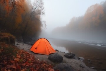 Orange tent on the bank of the river covered with fog in early morning. Generative AI
