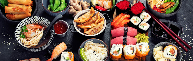 Traditional Japanese food dishes on black background