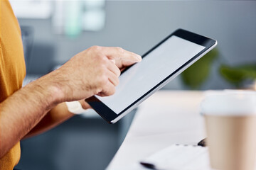 Man, hands and tablet with mockup screen for research, advertising or marketing at the office desk. Hand of male working on technology display for copy space in digital planning at the workplace
