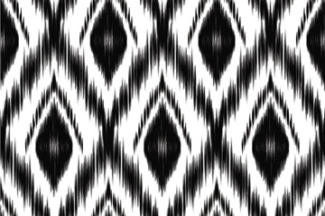 ikat black white Abstract Ethnic art. Seamless pattern in tribal, folk embroidery, style. Aztec geometric art ornament print.Design for carpet, cover.wallpaper, wrapping, fabric, clothing