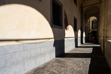 the shadows reflected by the arches in Padua, Italy