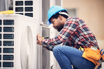 Black man, electrician and maintenance on air conditioner with engineering and handyman working...