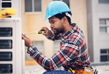 Black man, technician and maintenance with engineering and ac repair with handyman working with...