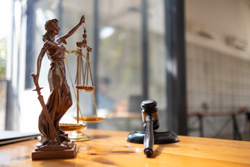 statue of god Themis Lady Justice is used as symbol of justice within law firm to demonstrate...