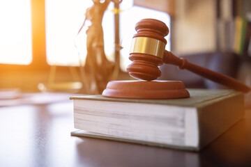 wooden judge gavel on table as symbol of justice for use in legal cases judicial system and civil...