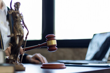 wooden judge gavel on table as symbol of justice for use in legal cases judicial system and civil...